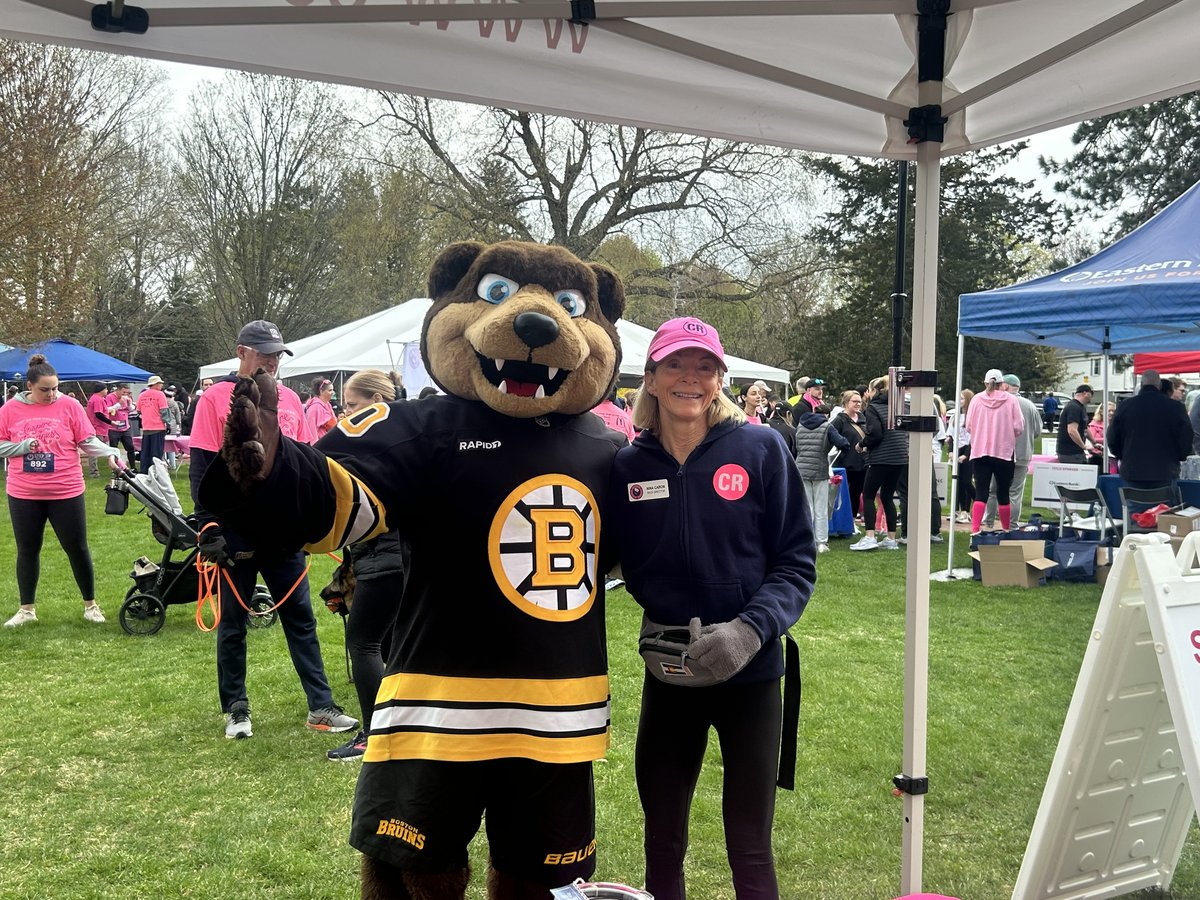Nina Caron with the Boston Bruins mascot at the Step Up for Colleen 5K