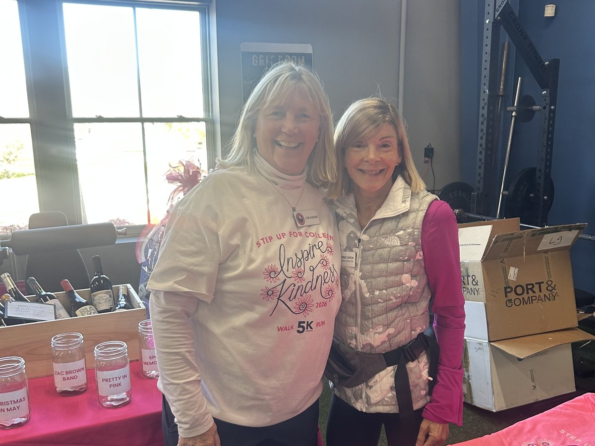 Nina Caron with a fellow volunteer at the Step Up for Colleen shirt and raffle table